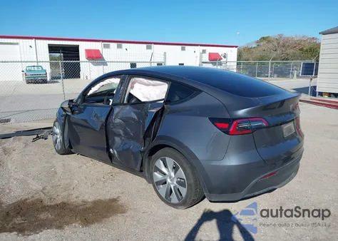 2023 Tesla Model Y Awd/Long Range Dual Motor All-Wheel Drive z USA, uszkodzony, nr VIN 7SAYGDEE4PA161053